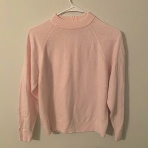 light pink mock neck sweater